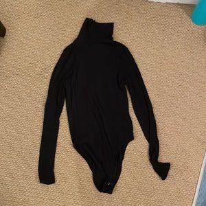 Ribbed long sleeve black body suit turtle neck